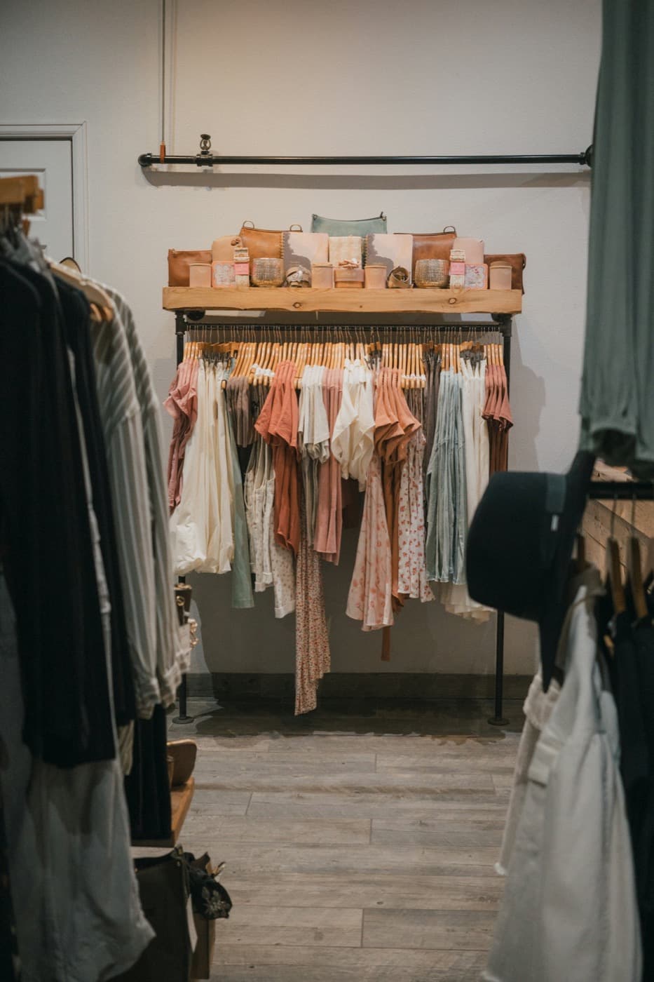 A styled boutique clothing rack, merchandised and ready for launch
